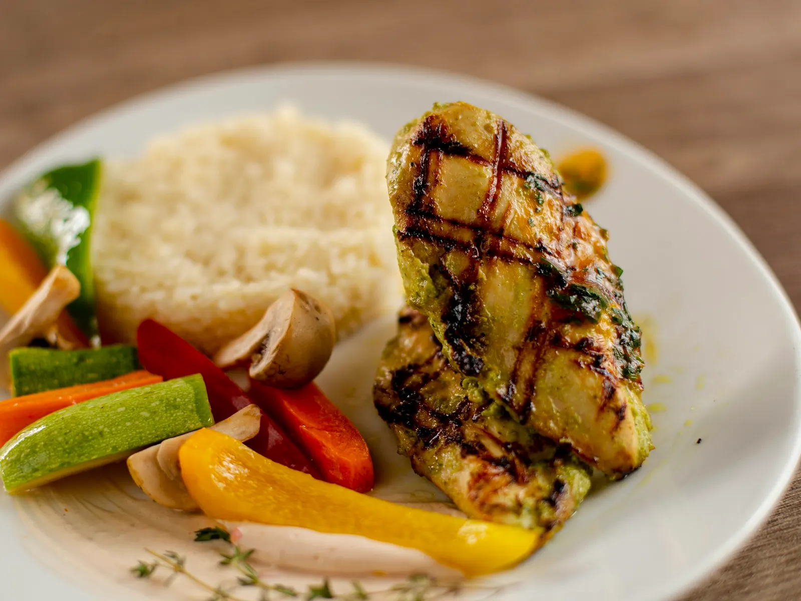 Grilled Greek yogurt marinated chicken breast with vegetables