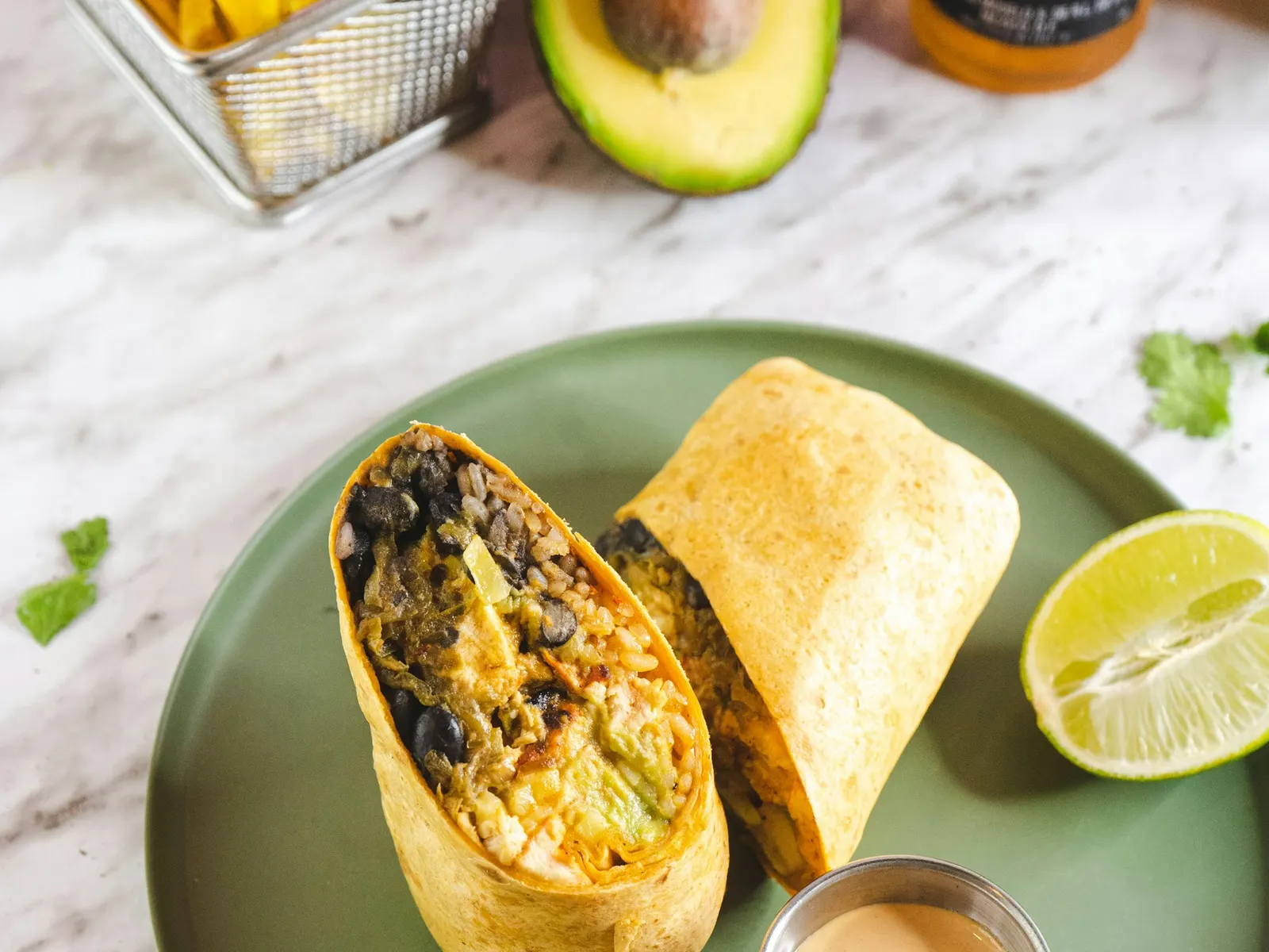 High protein breakfast burrito cut in half