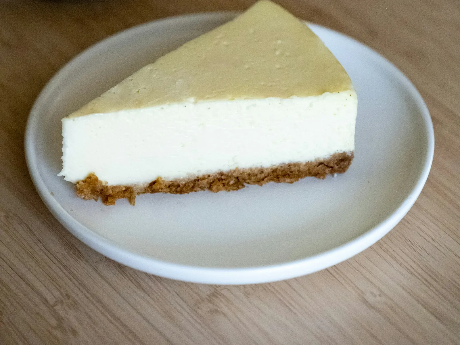 Slice of baked protein cheesecake